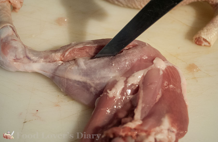Carefully cut the meat from the thigh