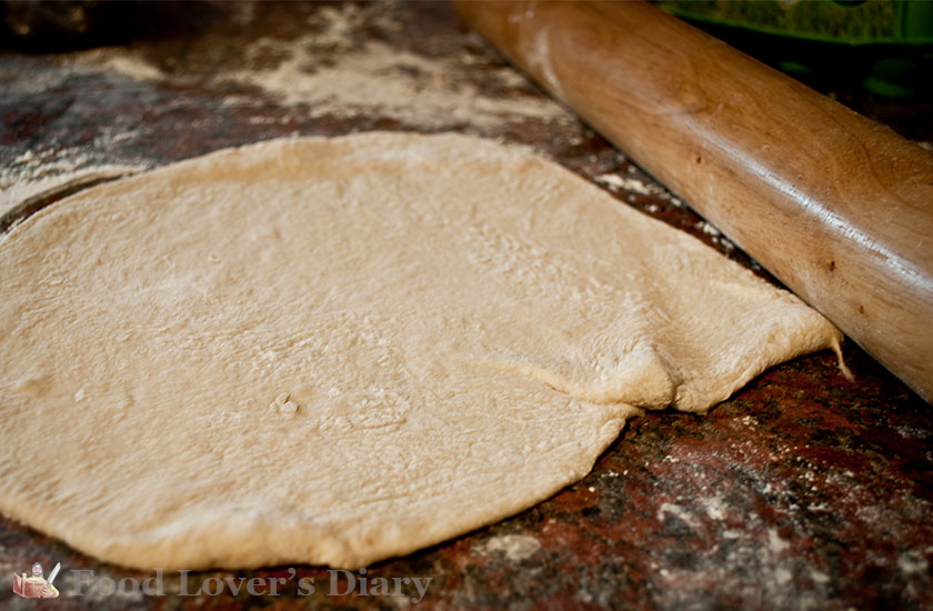 Flatbreads rolled out into rough shapes